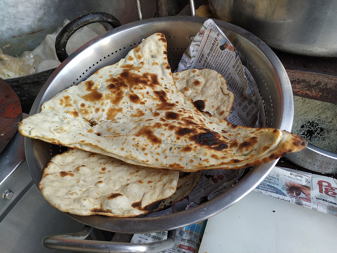 Fresh naan breads served hot from the tandoor